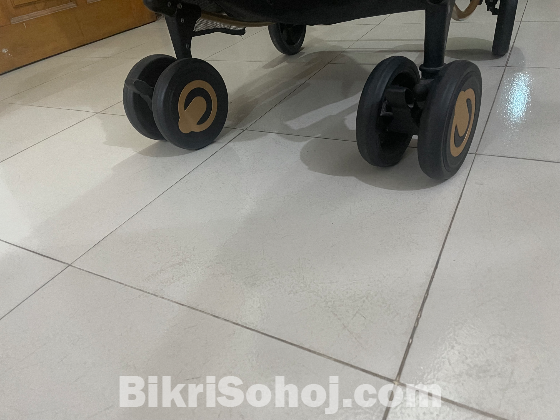 বেবি স্ট্রোলর ও রকার
